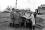Members of the Board of Governors, Mr. Sterling Cole, Director General of the IAEA, and other officials of the IAEA visit the site of the laboratory which is due to start operation in 1961. In the background, the reactor and laboratories of the SGAE are under construction, 9 April 1959.