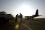 The specially converted plane is loaded with seven million flies.  Once airbone, the flies are expelled in bursts and streams from a funnel leading  to the outside world.