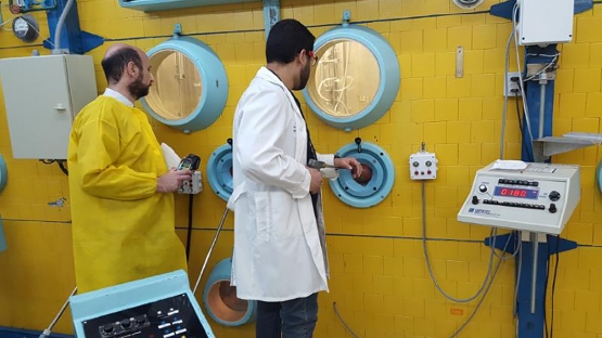 ORPAS team member monitoring the process during the production of Iodine-131 at the CCHEN Atomic Centre Lo Aguirre. (R. C. Suarez/IAEA)