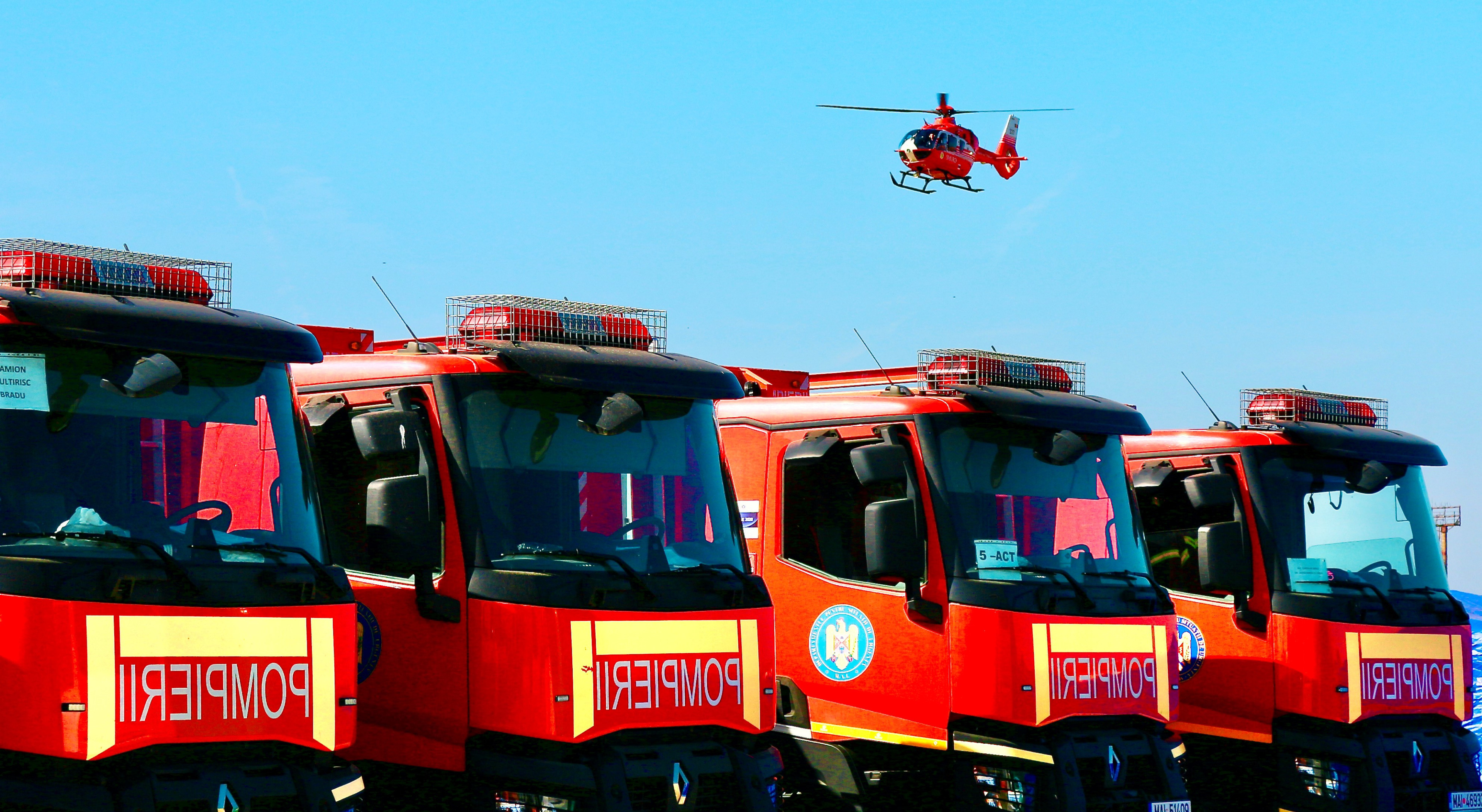 A row of emergency response fire trucks stand ready for action as part of the national preparedness exercise “Valahia” in Romania in October 2023. A row of emergency response fire trucks stand ready for action as part of the national preparedness exercise “Valahia” in Romania in October 2023.